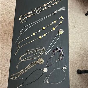 9 necklaces in varying lengths